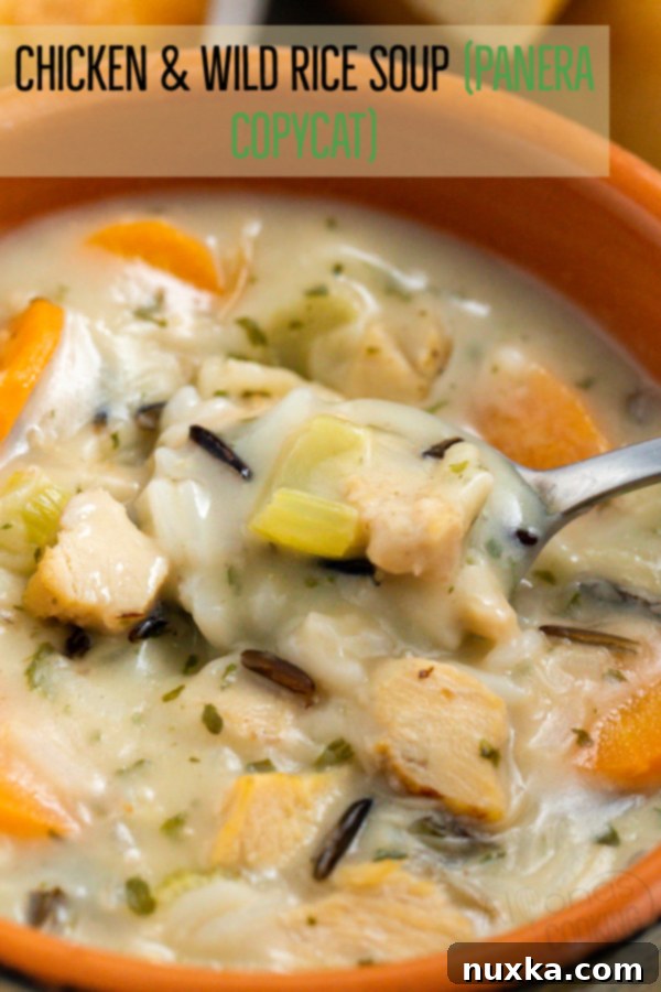Hearty bowl of homemade creamy chicken and wild rice soup, perfect for a cold day