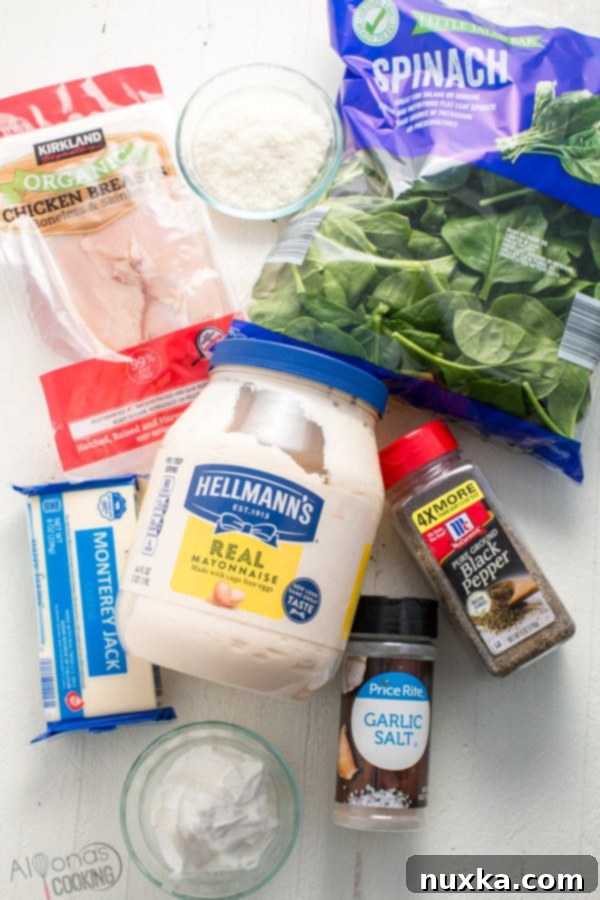 Image showing all fresh ingredients laid out for creamy spinach chicken casserole recipe