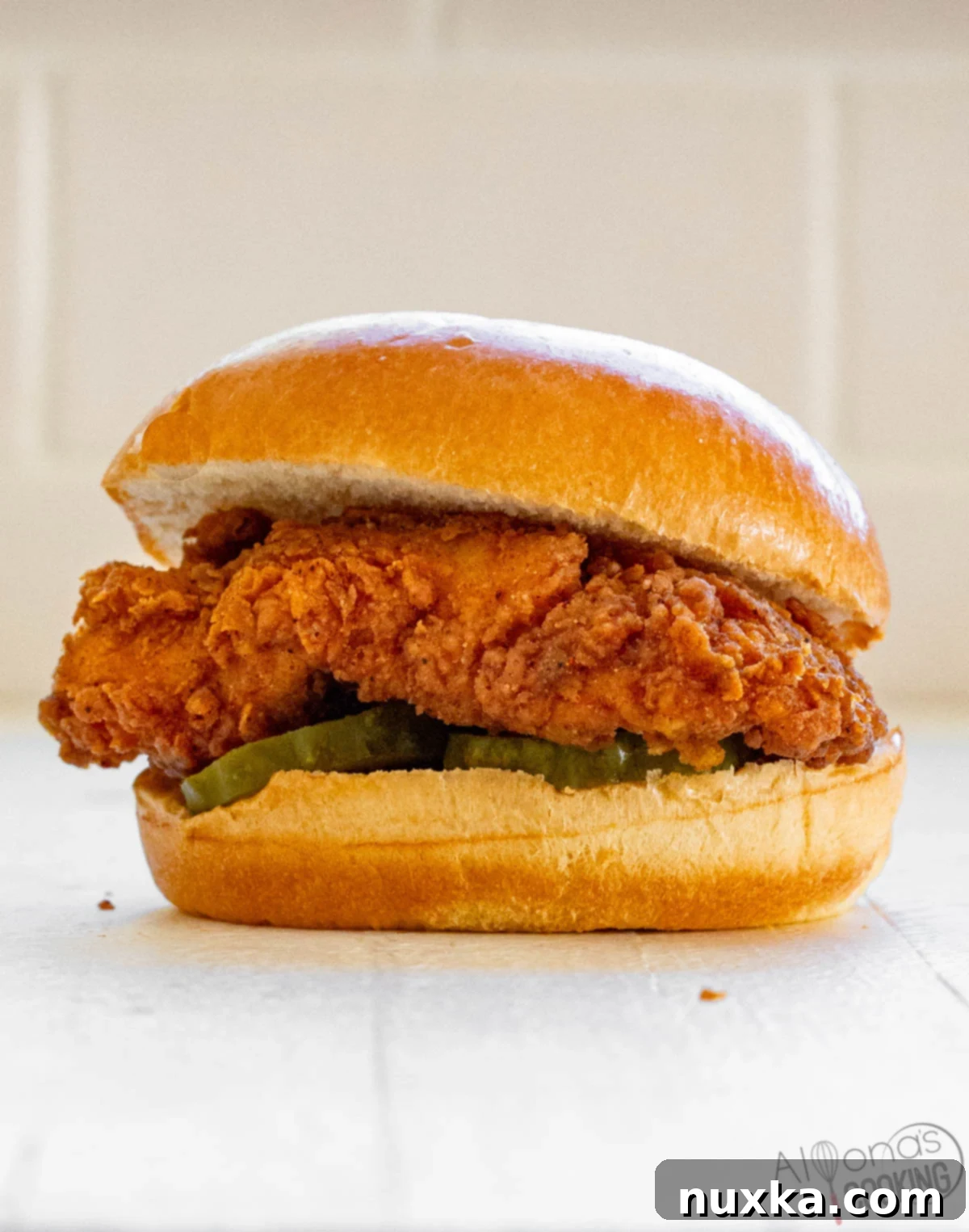 Chick Fil A Chicken Sandwich recipe with marinated chicken breasts then breaded in a seasoned flour and deep fried.