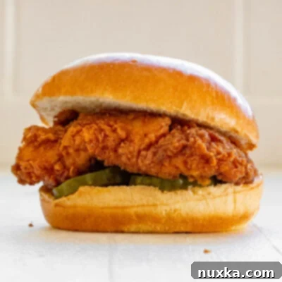 Chick Fil A Chicken Sandwich recipe with marinated chicken breasts then breaded in a seasoned flour and deep fried.