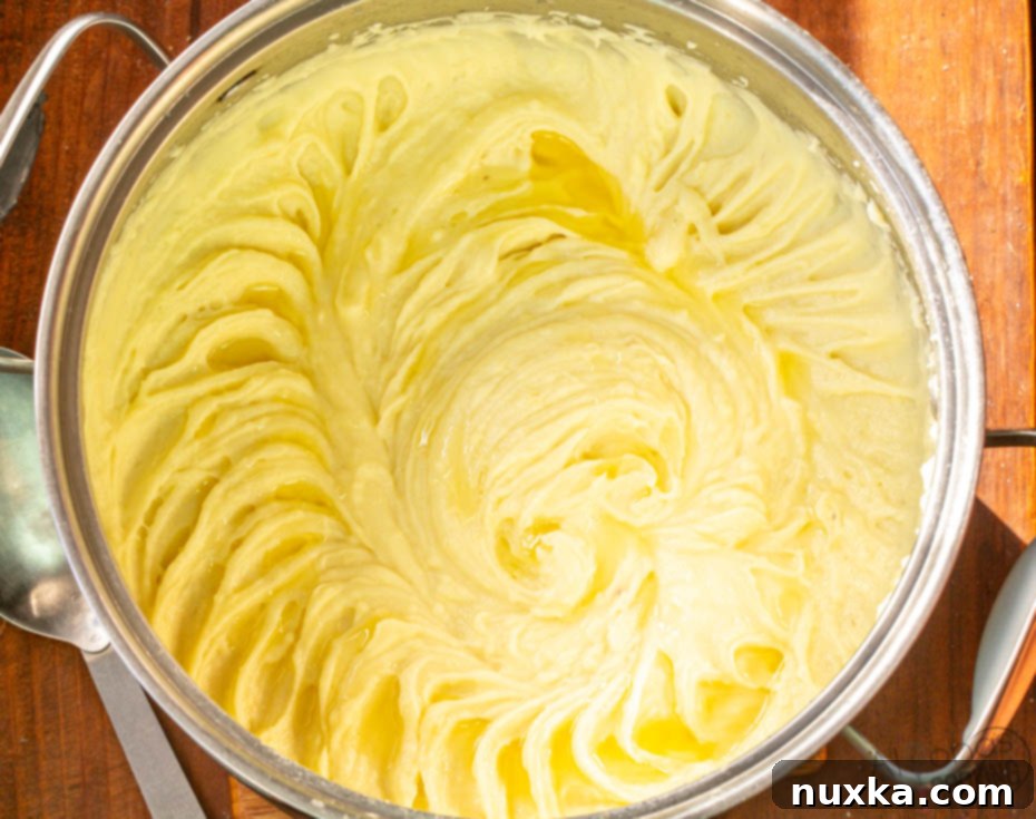The best creamy mashed potatoes recipe, showcasing a smooth and rich texture.