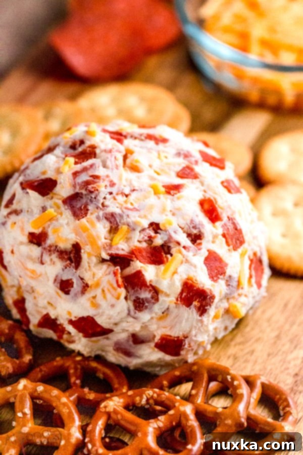 Hand shaping a cheese ball