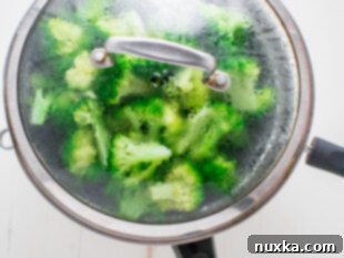 Steaming broccoli in a pot