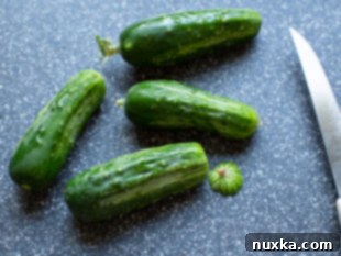 blossom ends of cucumbers trimmed