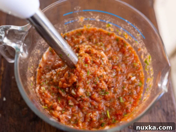 image of blended salsa using a stick blender